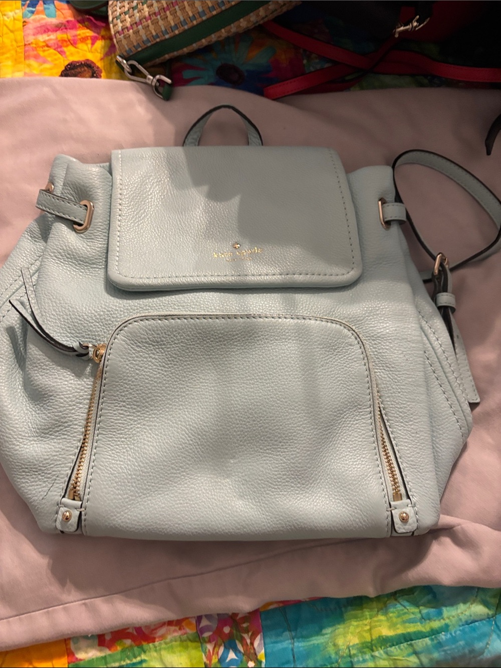 kate spade pale blue pebbled leather backpack with gold hardware